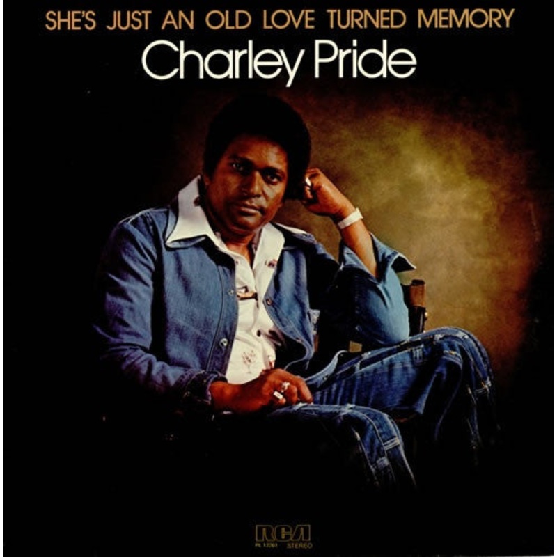 Charley Pride – She’s Just An Old Love Turned Memory (LP, Album) (Very Good Plus (VG+))