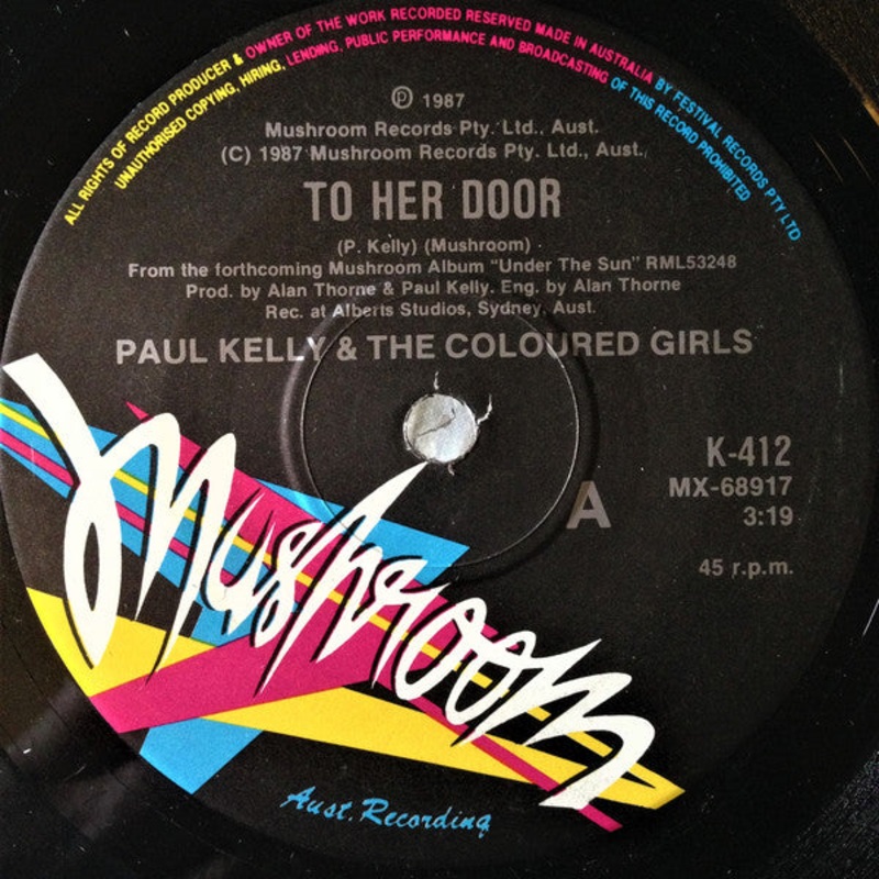 Paul Kelly & The Coloured Girls – To Her Door (7, Single) (Very Good (VG))