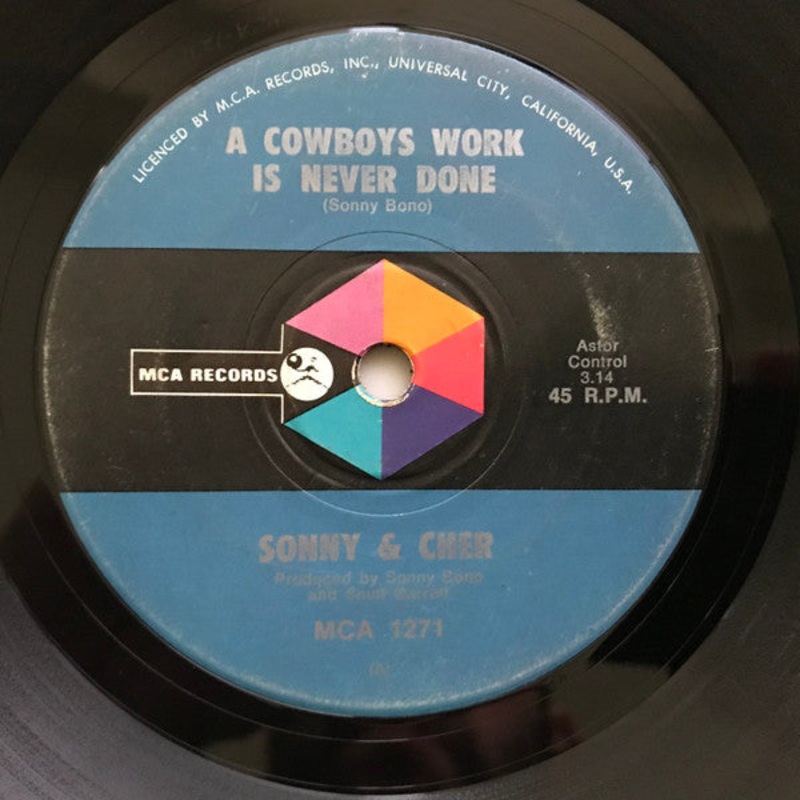 Sonny & Cher – A Cowboys Work Is Never Done (7, Single) (Very Good Plus (VG+))